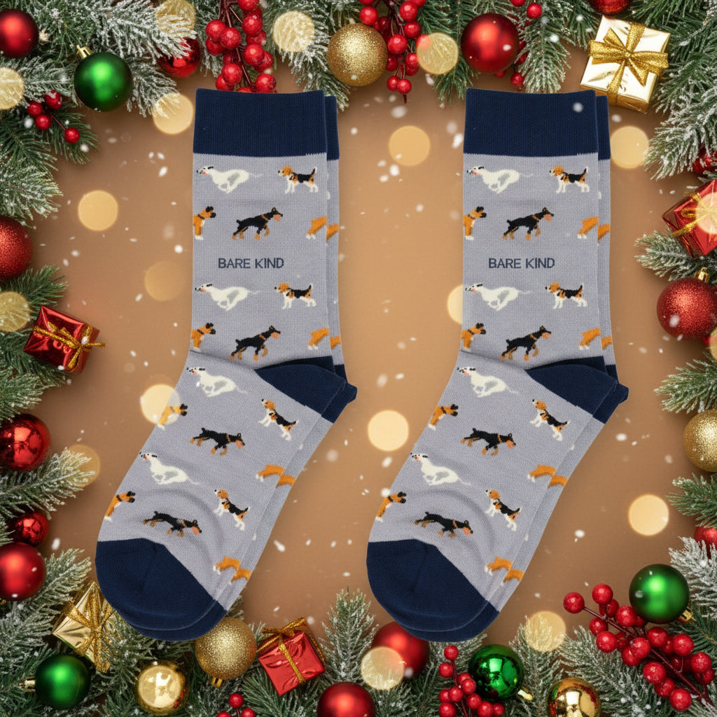 Pair of socks with dog pattern and 'Bare Kind' text on a white background